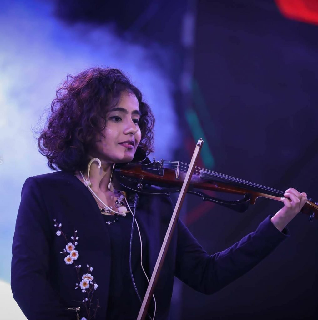 Kavya Ajit – an Indian singer, violinist and a live performer born in ...