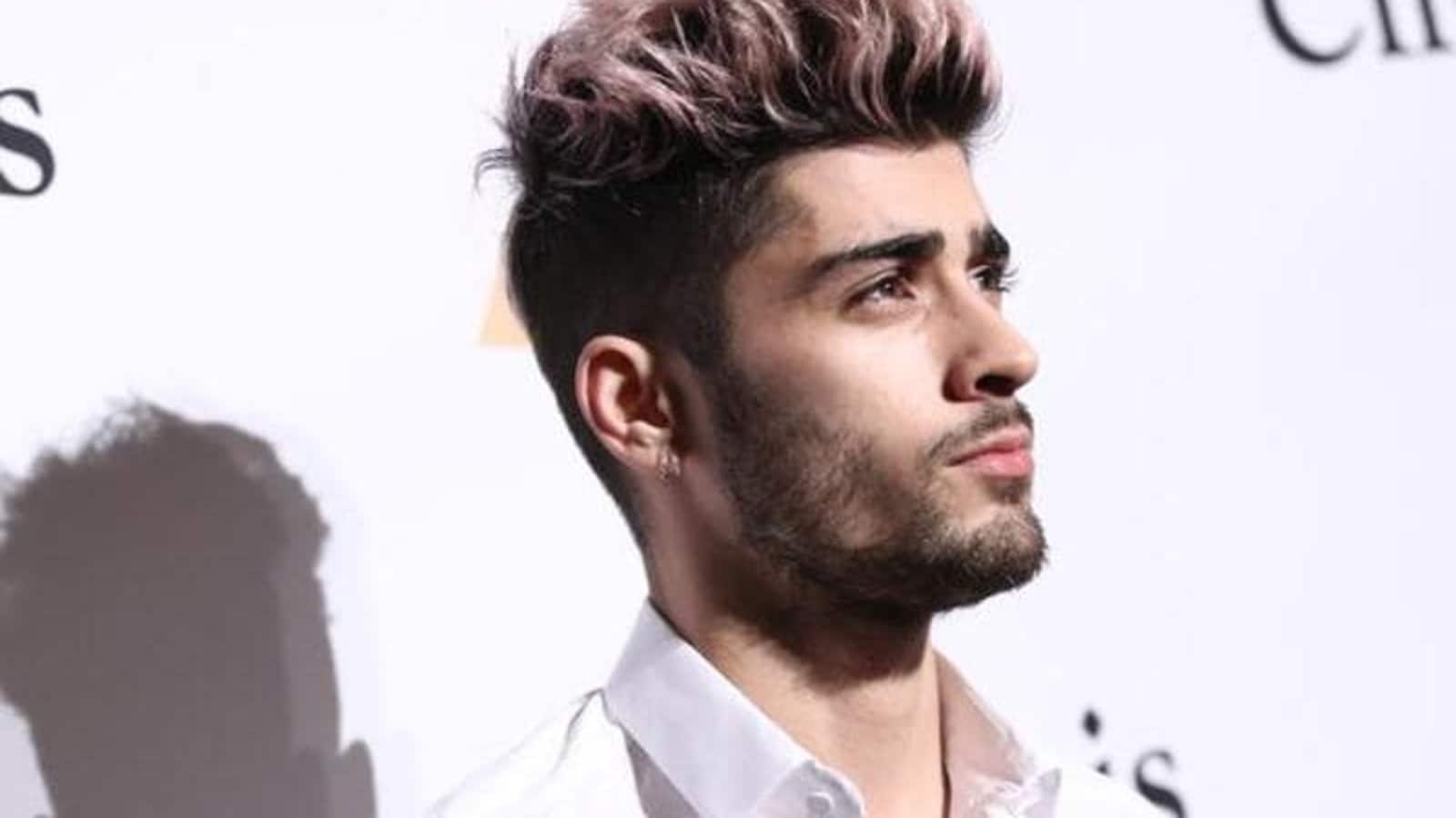 Zayn signed it! Parisian fan meltdown as Malik revives One Direction memories 8 www.talentsofworld.com | Talentsofworld Articles