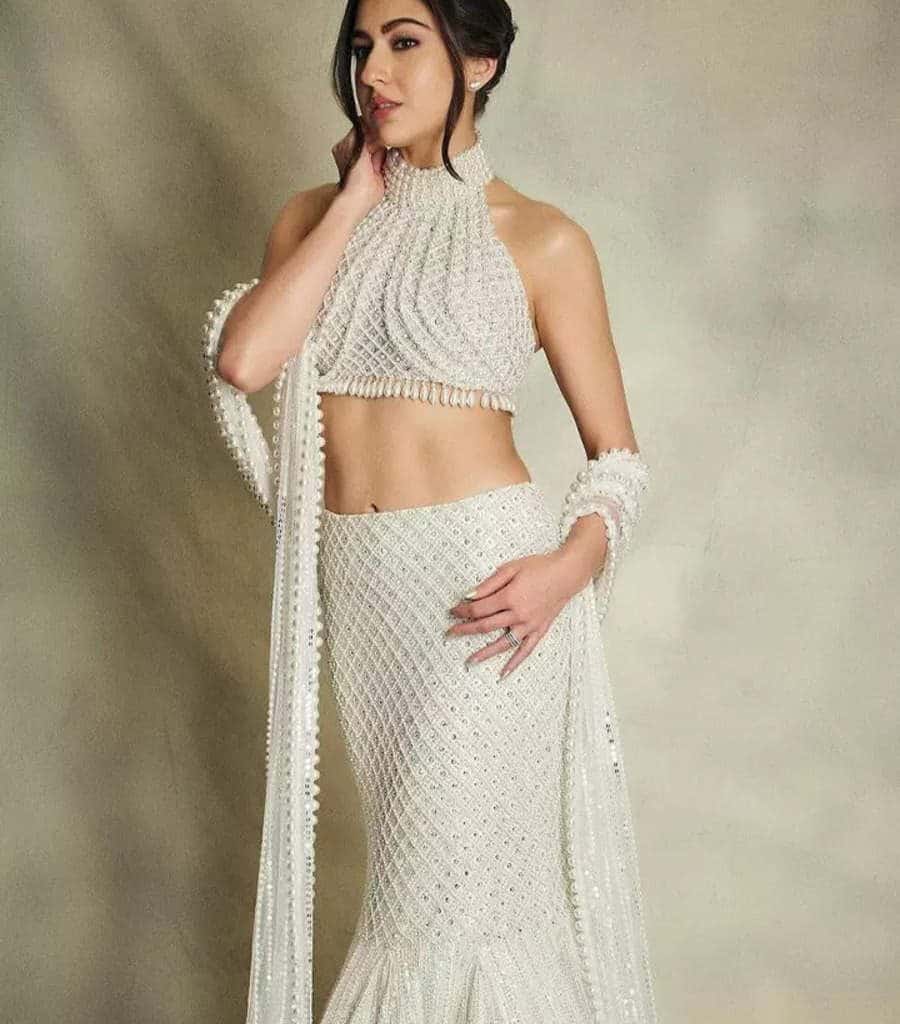 Sara Ali Khan is a vision to behold in a white pearl lehenga at the Ambani bash 4 Sara Ali Khan is a vision to behold in a white pearl lehenga at the Ambani bash