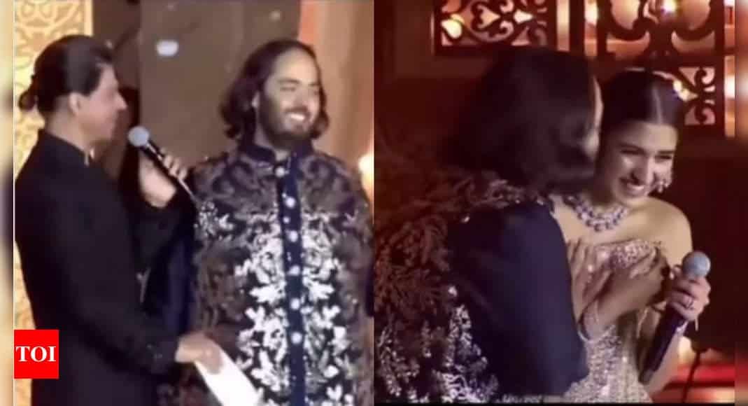 Netitzens react as Radhika Merchant calls Shah Rukh Khan 'uncle' and dedicates his iconic romantic dialogue to Anant Ambani, the latter kisses her and it's heart melting - WATCH video | Hindi Movie News - Times of India