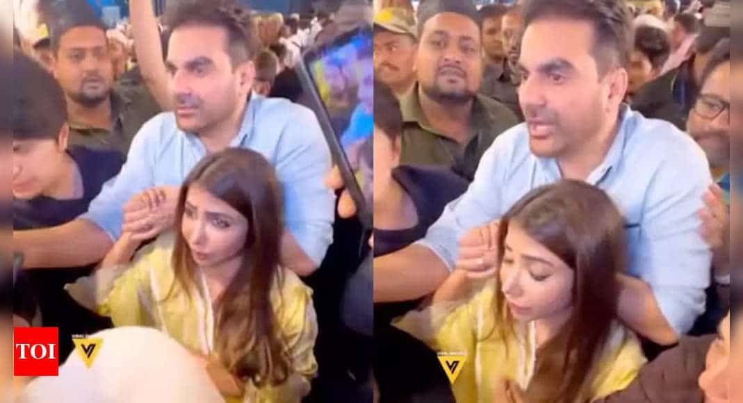 Arbaaz Khan protects wife Sshura as they get mobbed by a massive crowd outside a restaurant | Hindi Movie News - Times of India