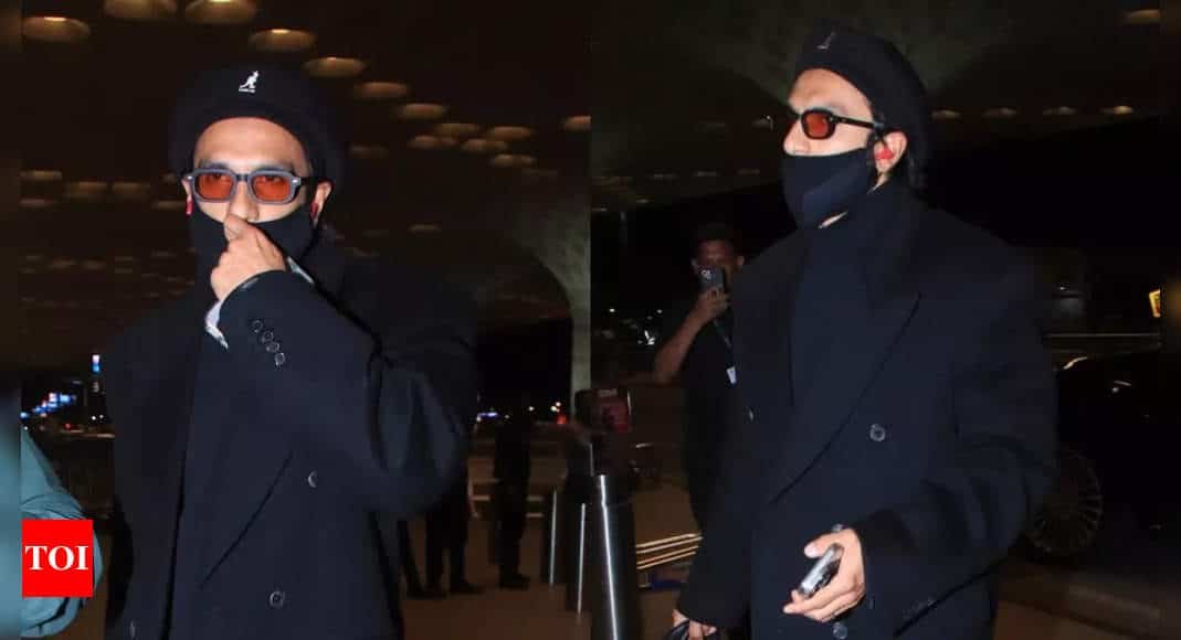 Ranveer Singh hides his face at the airport, fans wonder if he's hiding his 'Don 3' look, but he wins the internet with THIS gesture - WATCH | Hindi Movie News - Times of India