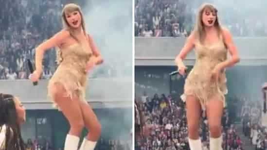 Taylor Swift dancing on stage during the show.