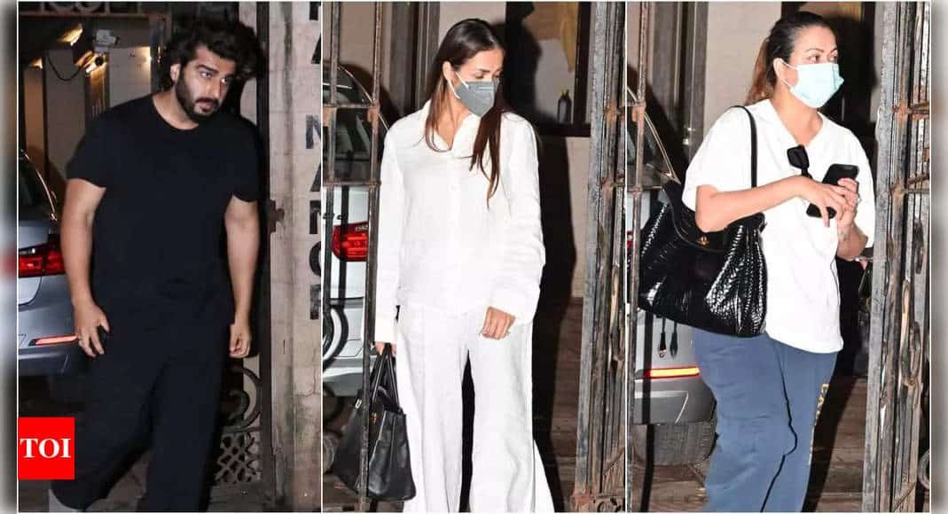 Arjun Kapoor gets visibly upset with a paparazzo for blocking Malaika Arora's car as she leaves her parent's house - Times of India