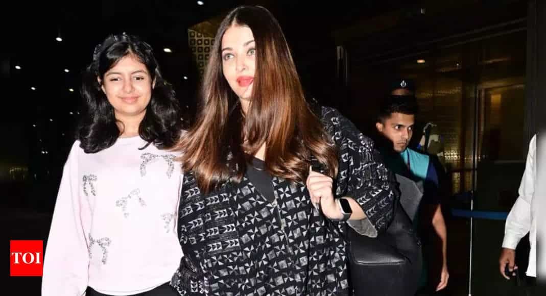 Aishwarya Rai Bachchan and daughter Aaradhya Bachchan all smiles as they return to Mumbai after shutting down a reporter in Abu Dhabi - Times of India