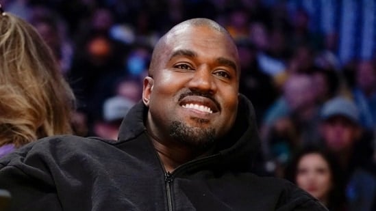  Kanye West, known as Ye, watches the first half of an NBA basketball game between the Washington Wizards and the Los Angeles Lakers (AP Photo/Ashley Landis, File)(AP)