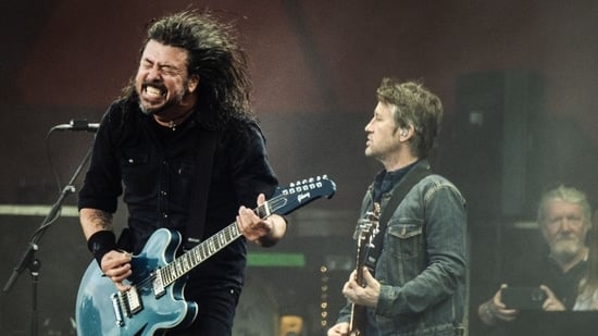US musician Dave Grohl of rock band Foo Fighters performs on the Orange Stage at Roskilde Festival on July 5, 2024 in Roskilde, Denmark. (Photo by Helle Arensbak / Ritzau Scanpix / AFP) / Denmark OUT(AFP)