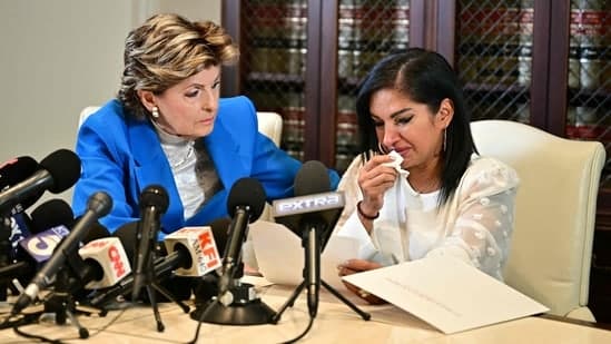 Attorney Gloria Allred (L) listens to Thalia Graves, an alleged victim of Rap mogul Sean Diddy Combs, during a press conference in Los Angeles on September 24, 2024. (AFP)