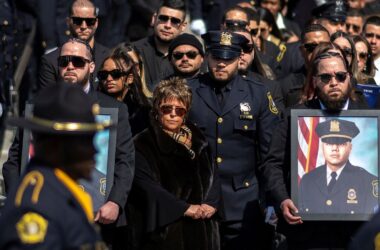 Newark detective Joseph Azcona was chasing teen who displayed gun on Instagram live video before deadly shootout: Report | Today News 14 US Senator Cory Booker (D-NJ)  attends the funeral service of New Jersey police detective Joseph Azcona, killed in a gunfight by a 14-year-old boy, at the Cathedral Basilica of Sacred Heart in Newark, New Jersey, U.S., March 14, 2025. REUTERS/Eduardo Munoz